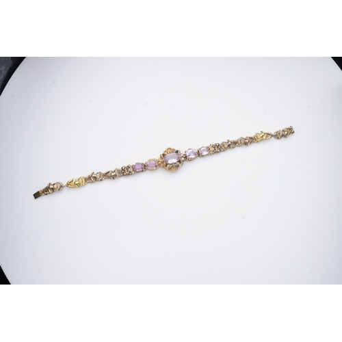 335 - A pink topaz bracelet, mid 19th century set with a sequence of five oval pink topazes, to a gold bra... 