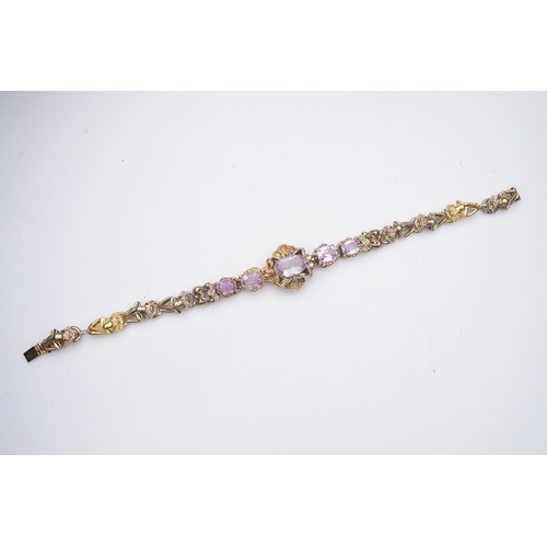 335 - A pink topaz bracelet, mid 19th century set with a sequence of five oval pink topazes, to a gold bra... 