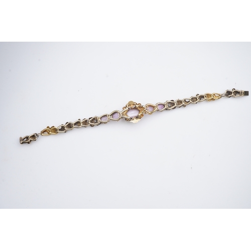 335 - A pink topaz bracelet, mid 19th century set with a sequence of five oval pink topazes, to a gold bra... 