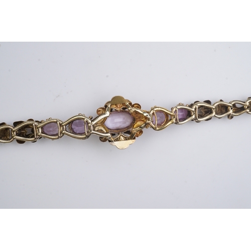 335 - A pink topaz bracelet, mid 19th century set with a sequence of five oval pink topazes, to a gold bra... 