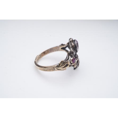 337 - A ruby, rock crystal and diamond ring, of giardinetto design, set with rose-cut diamonds, oval rubie... 