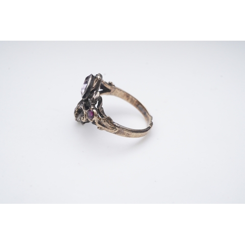 337 - A ruby, rock crystal and diamond ring, of giardinetto design, set with rose-cut diamonds, oval rubie... 