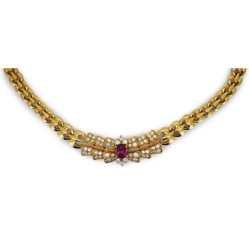 339 - A diamond and synthetic ruby necklace, set to the front with a cabochon synthetic ruby within a pavé... 