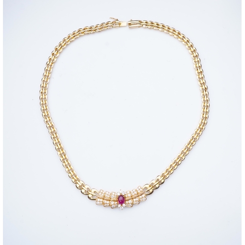 339 - A diamond and synthetic ruby necklace, set to the front with a cabochon synthetic ruby within a pavé... 