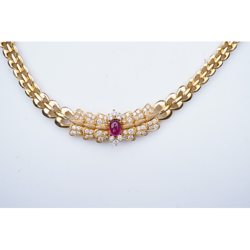 339 - A diamond and synthetic ruby necklace, set to the front with a cabochon synthetic ruby within a pavé... 