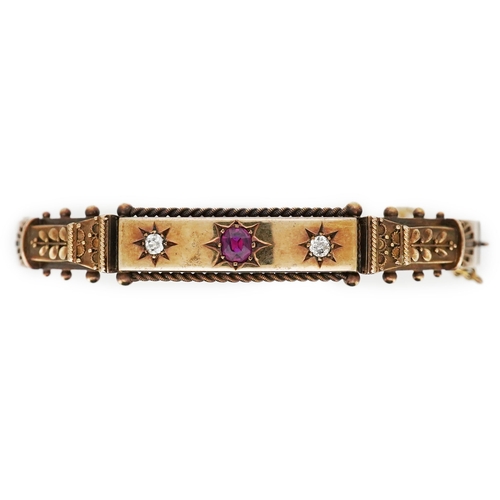 340 - An Edwardian ruby and diamond bracelet, circa 1905, of hinged design, the front applied with rope tw... 