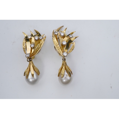 344 - A pair of aquamarine, cultured pearl and diamond ear clips, third quarter 20th century, composed of ... 