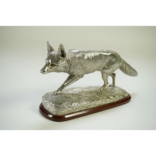 35 - An impressive Victorian silver sculpture of a fox en passant, by R & S Garrard & Co (Robert Garrard ... 