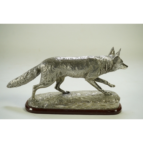 35 - An impressive Victorian silver sculpture of a fox en passant, by R & S Garrard & Co (Robert Garrard ... 