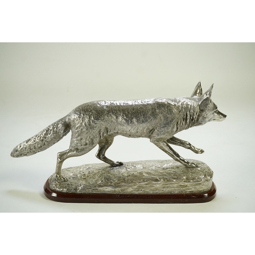 35 - An impressive Victorian silver sculpture of a fox en passant, by R & S Garrard & Co (Robert Garrard ... 