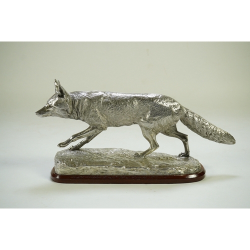 35 - An impressive Victorian silver sculpture of a fox en passant, by R & S Garrard & Co (Robert Garrard ... 