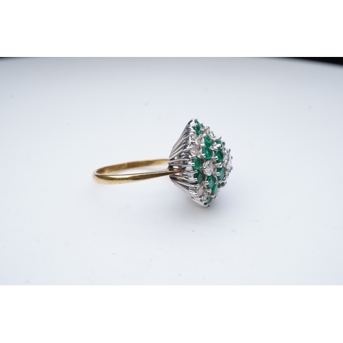 351 - An emerald and diamond cocktail ring, of bombé cluster design, set with brilliant-cut diamonds and c... 