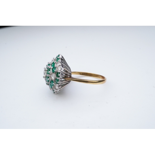 351 - An emerald and diamond cocktail ring, of bombé cluster design, set with brilliant-cut diamonds and c... 