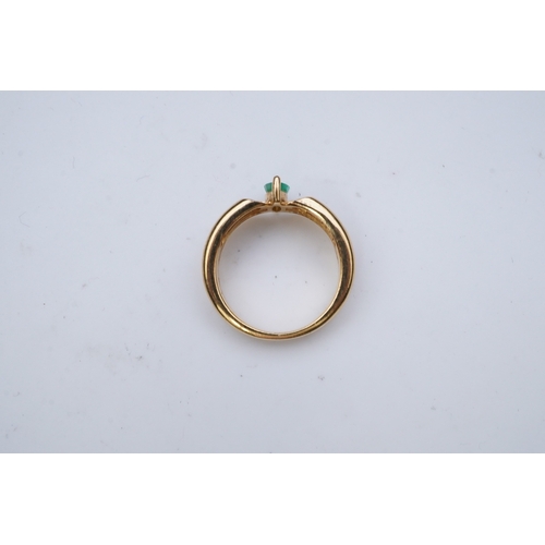 353 - An emerald and diamond ring, set with a marquise-shaped emerald, to a double band set with brilliant... 