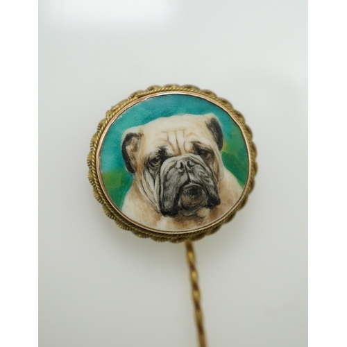 355 - Reuben Ward Binks (1880-1950), an enamel stick pin, circa 1917 topped with an oval enamel portrait o... 