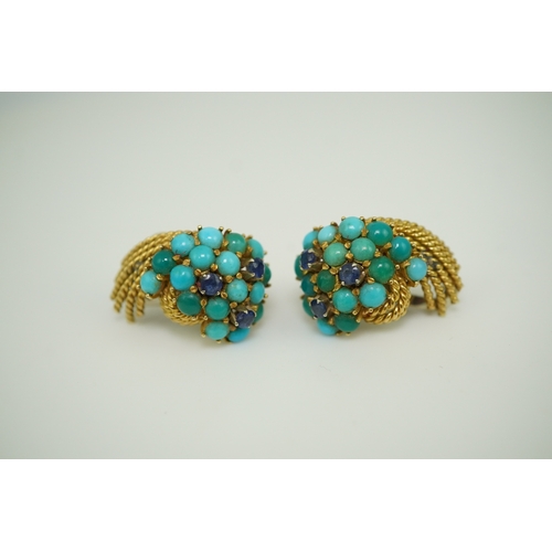 357 - A pair of turquoise and sapphire ear clips, 1960s each composed of curled rope twists of gold, set w... 