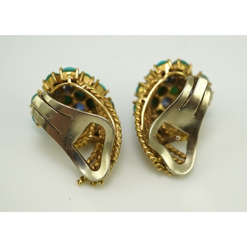 357 - A pair of turquoise and sapphire ear clips, 1960s each composed of curled rope twists of gold, set w... 