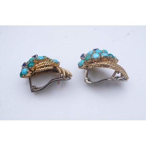 357 - A pair of turquoise and sapphire ear clips, 1960s each composed of curled rope twists of gold, set w... 