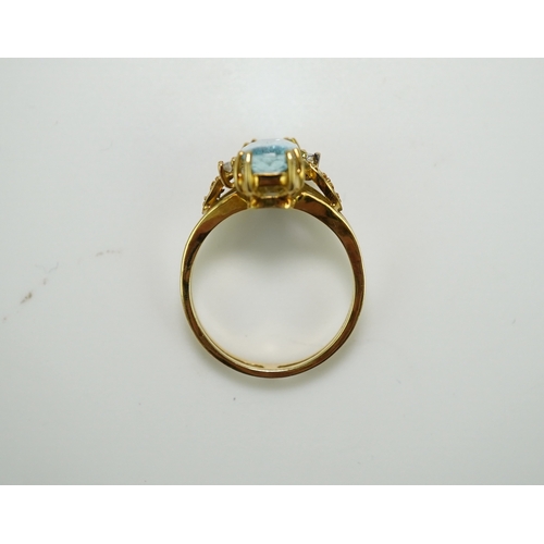 362 - An aquamarine and diamond ring, claw-set with an elongated cushion-shaped aquamarine measuring appro... 