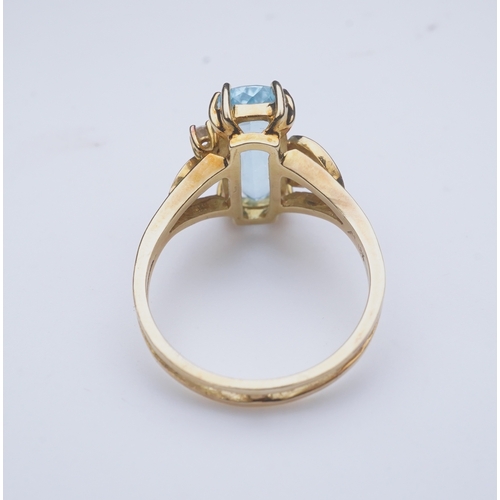 362 - An aquamarine and diamond ring, claw-set with an elongated cushion-shaped aquamarine measuring appro... 