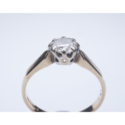 364 - A solitaire diamond ring, claw-set with a circular-cut diamond weighing approximately 0.60 carats, m... 