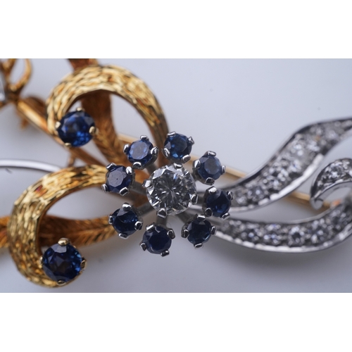 366 - A sapphire and diamond brooch, third quarter 20th century, designed as an abstract foliate spray, se... 