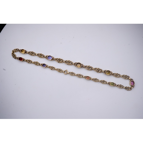 368 - A multi-gem necklace, designed as a series of collet-set oval gemstones of various colours, includin... 