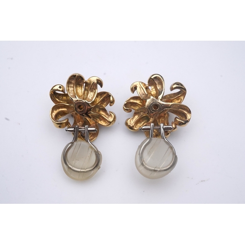 369 - A pair of Retro citrine and diamond ear clips, circa 1940, each designed as a flower, set with a clu... 