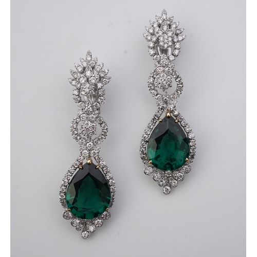 374 - A pair of synthetic green quartz and diamond earrings each of articulated pendent design, set with b... 