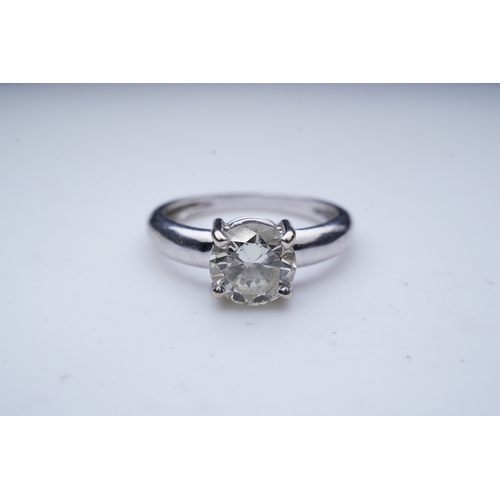 376 - A solitaire diamond ring, claw-set with a brilliant-cut diamond weighing approximately 1.20 carats, ... 