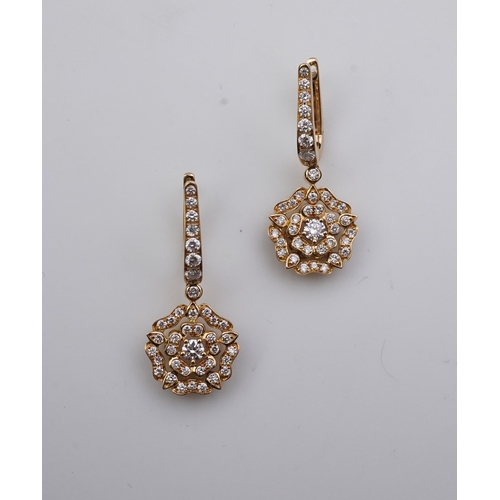 378 - Garrard, a pair of diamond 'Tudor Rose Mini Icon' earrings each suspending a Tudor Rose motif, pavé-... 