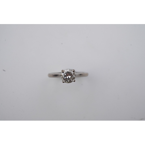 380 - A solitaire diamond ring, claw-set with a brilliant-cut diamond weighing approximately 0.65 carats, ... 