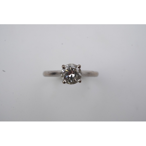 380 - A solitaire diamond ring, claw-set with a brilliant-cut diamond weighing approximately 0.65 carats, ... 