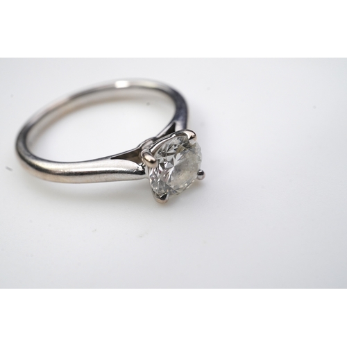 380 - A solitaire diamond ring, claw-set with a brilliant-cut diamond weighing approximately 0.65 carats, ... 