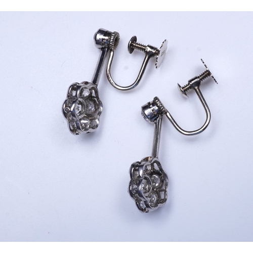 384 - A pair of diamond earrings, early 20th century each composed of a surmount suspending a floral clust... 