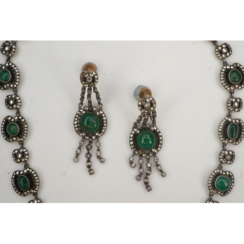 392 - An emerald and rock crystal demi-parure, France, early 20th century, comprising: a necklace, compose... 