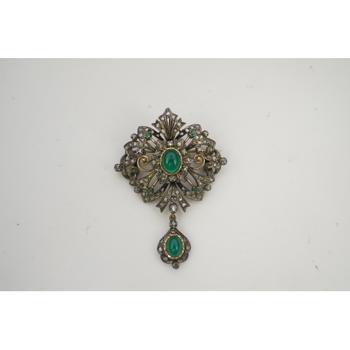 394 - A green chalcedony and diamond brooch, mid 20th century, of scroll design suspending a pendant, set ... 