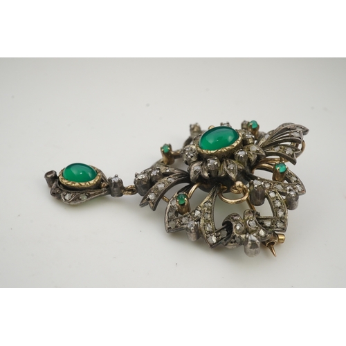 394 - A green chalcedony and diamond brooch, mid 20th century, of scroll design suspending a pendant, set ... 