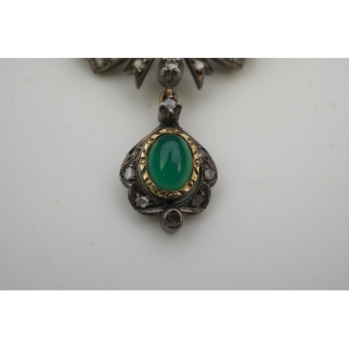 394 - A green chalcedony and diamond brooch, mid 20th century, of scroll design suspending a pendant, set ... 