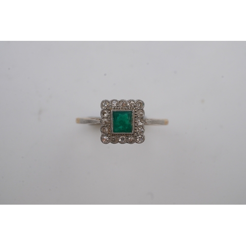 396 - An emerald and diamond ring, early 20th century, designed as a square cluster, set with a square mix... 