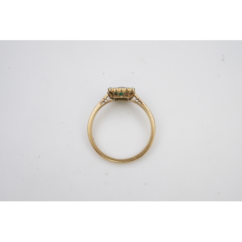 396 - An emerald and diamond ring, early 20th century, designed as a square cluster, set with a square mix... 