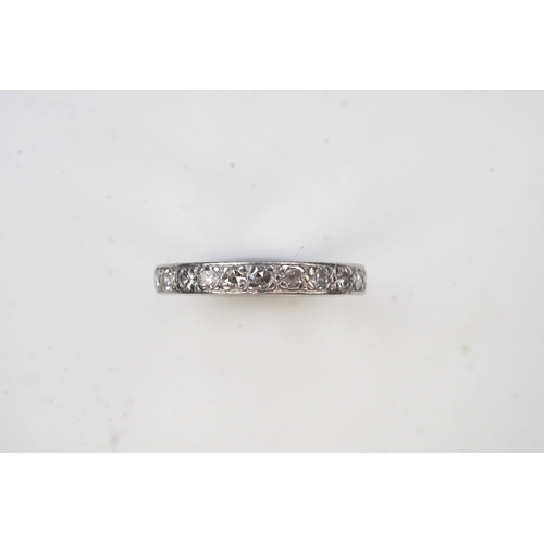 401 - A diamond eternity ring, mid 20th century, set with a continuous band of single-cut diamonds totalli... 