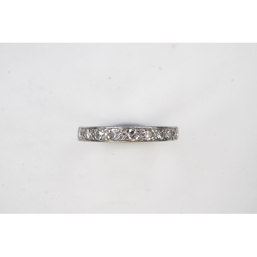 401 - A diamond eternity ring, mid 20th century, set with a continuous band of single-cut diamonds totalli... 