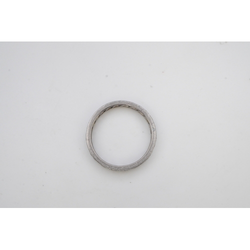 401 - A diamond eternity ring, mid 20th century, set with a continuous band of single-cut diamonds totalli... 