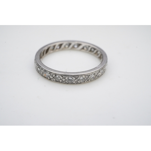 401 - A diamond eternity ring, mid 20th century, set with a continuous band of single-cut diamonds totalli... 