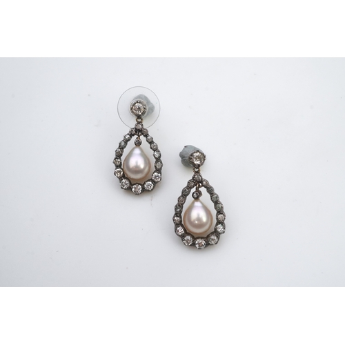 411 - A pair of cultured pearl and diamond earrings, each designed as a pear-shaped drop, suspending a cul... 