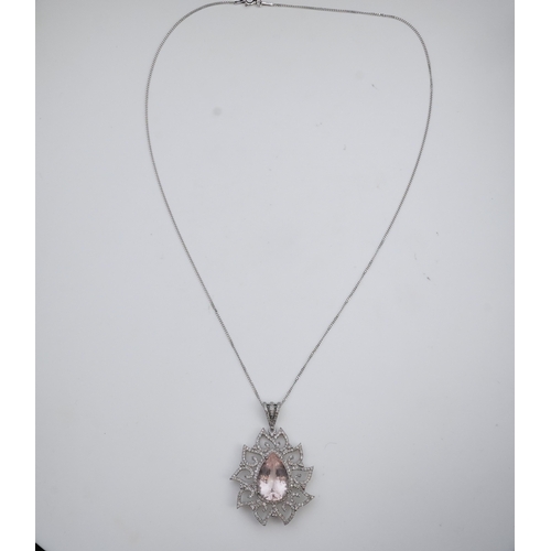 412 - A morganite and diamond pendant, set with a pear-shaped morganite weighing 8.80 carats, within a fol... 