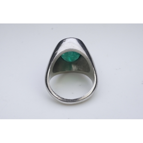 418 - An emerald signet ring, rubover set with an oval emerald measuring approximately 15.7mm x 10.9mm x 7... 