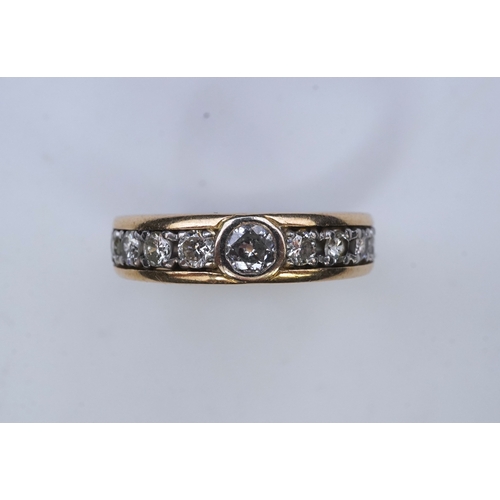 425 - A diamond eternity ring, centring on a circular-cut diamond weighing approximately 0.25 carats, to a... 