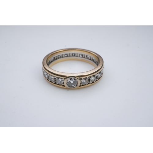 425 - A diamond eternity ring, centring on a circular-cut diamond weighing approximately 0.25 carats, to a... 